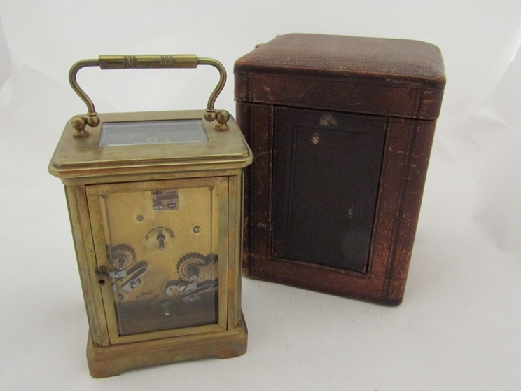 A late 19th early 20th Century brass carriage clock with alarm, red case a/f - Image 2 of 2