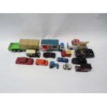 A small quantity of vintage car toys including London Taxis and Pepsi Wagon