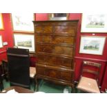 A George II revival figured walnut chest on stand of two short over four long drawers, with