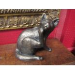 A Frith sculpture of a cat, 22.5cm tall, 22cm long