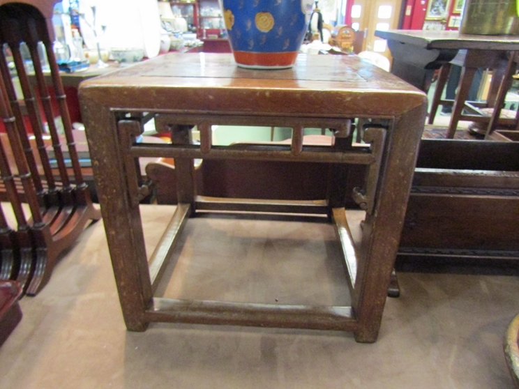 A pair of 19th Century Chinese urn tables. 44cm high