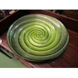 A large glass dish with swirl design, 43.5cm diameter