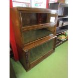 A Globe Wernicke style oak bookcase with three glazed doors. 107 x 90 x 38cm