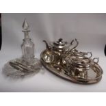 A selection of silver plated items including a galleried tray of pierced form and a Gerogian glass