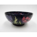 A Moorcroft Blue Anemone pattern bowl, WM monogram to base, 34/94, 15.5cm diameter