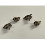 A set of four silver miniature pigs, 56g