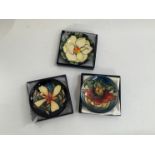Three Moorcroft pindishes, Panache, Southern Magnolia and Anna Lily, all boxed