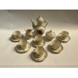 A Royal Copenhagen coffee set for six, floral sprays