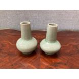 A pair of Chinese celadon glaze vases, bulbous form, 10.5cm tall