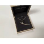 A Georg Jensen Uno pendant on chain, boxed