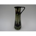 A Moorcroft Moonlight Tulip pattern jug by Emma Bossons, 24cm tall, boxed