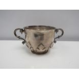 A Lambert & Co. silver porringer with s scroll handles, acanthus leaf decoration, London 1909,