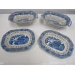 A pair of Spode Willow pattern blue and white transfer ware Chestnut baskets and stands