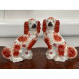 A pair of Staffordshire mantel dogs, 31cm tall