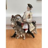 A 19th Century Meissen porcelain large figure of Count Bruhl’s tailor (Barn Von Maunchsen) astride a