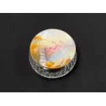 A cut glass powder jar with a silver framed Royal Worcester lid depicting flamingos signed R.Austin,