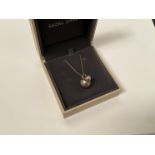 A Georg Jensen Cave pendant on chain, boxed