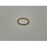 An 18k gold wedding band, size J, slim form, 1.5g