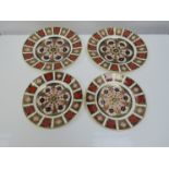 Four Royal Crown Derby Old Imari plates, 27cm and 22cm diameter