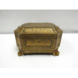 A 19th century Chinese export lacquer gilded tea caddy, the sides and lids heavily decorated with