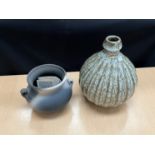 Muchelney Pottery: A smoke fired vase, dated ‘98, together with a Nick Reese bottle vase of ribbed