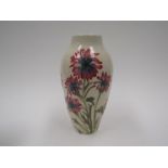 A Moorcroft Pink Daisy Trial pattern vase, 21cm tall, boxed