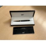 A Mont Blanc Classique fountain pen in black with gold detail, boxed with booklet