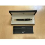 A Mont Blanc Classique ballpoint pen in black with gold detail, boxed with booklet