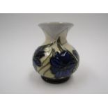 A Moorcroft Chilean Crocus pattern miniature vase, 9.5cm tall, boxed