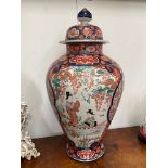 A late 19th / early 20th Century Chinese Imari floor jar with cover, repaired, 69cm tall including