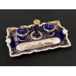 A Worcester Chamberlains porcelain deskstand with painted image of The Royal Porcelain Works,