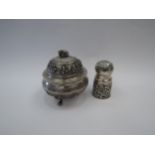 A white metal Eastern lidded pot with elephant form knop together with a silver cased bottle with