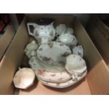 A Royal Doulton "Old Leeds Sprays" pattern part tea and dinner service