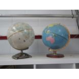 Two World globes on stands