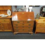 A mahogany reproduction bureau in the 18th Century style. 104cm x 95cm x 54cm