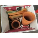 A box of miscellaneous including ceramic chicken, pictures, terracotta wine coolers etc
