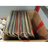 A box of vinyl albums including film scores, Abba etc