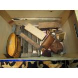 A box containing cut throat razors and related shaving items