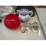 A blue and white transfer jug, a USSR tiger and a red glass fish bowl form vase (3)