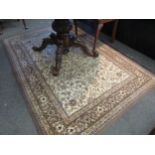 A Belgian brown and beige ground rug, 196cm x 132cm