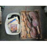 A box of violins and parts together with vinyl singles etc