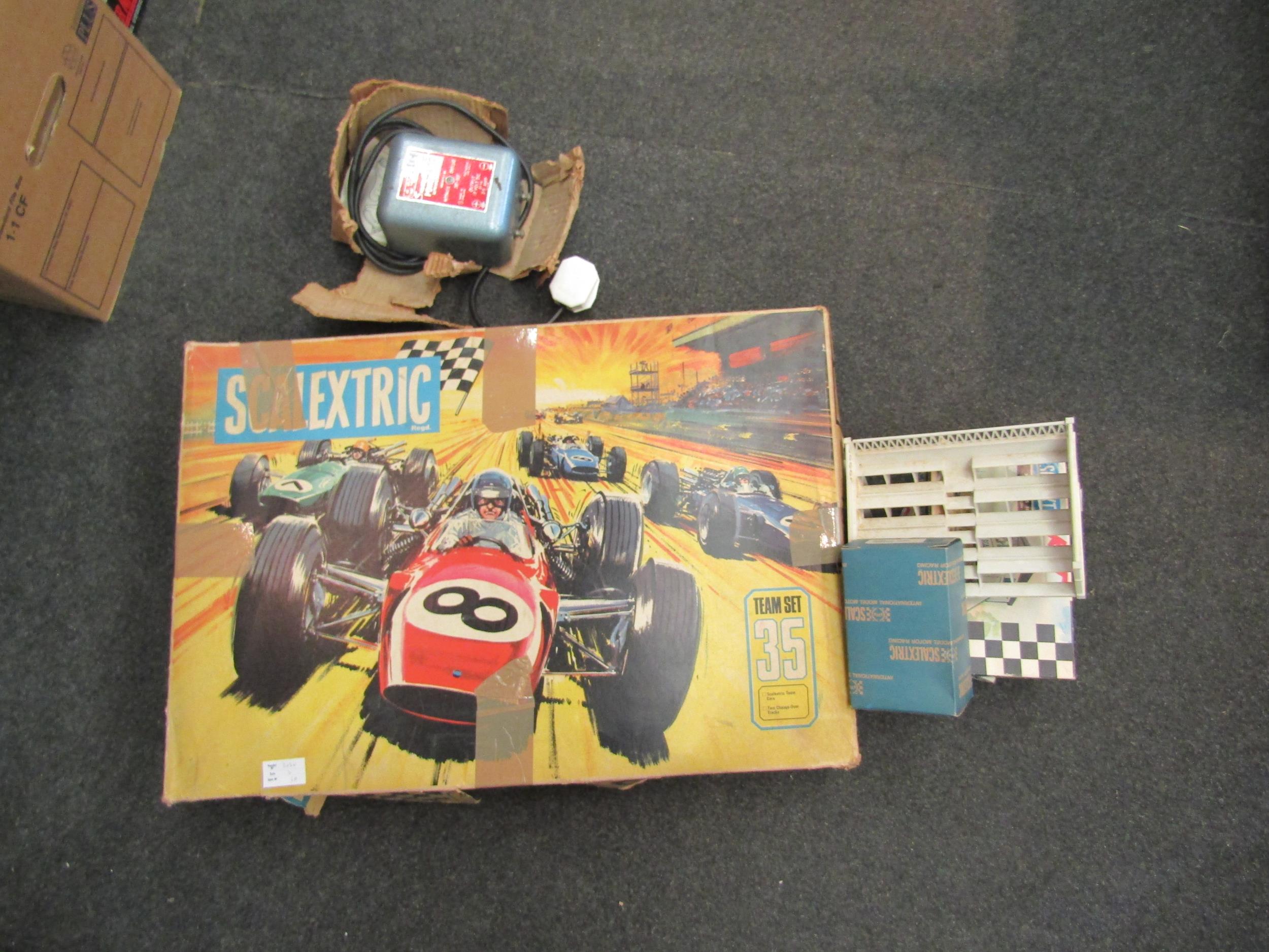 Vintage Scalextric Team Set 35 with original racing cars and accessories