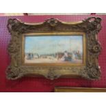 An print on canvas after William Chase Merritt depicting a beach scene in an elaborate gilt frame,