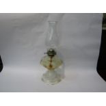 A glass oil lamp, 46cm tall