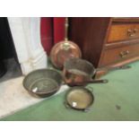 A selection of copper wares including bed warmer, saucepan, frying pan and twin handled dish (4)