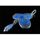A James Fenton silver Art Nouveau enamel pendant in blue, hung with droplet, marked JF