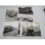 A box containing various black and white photographs of EMU's (Electric Multiple Units)