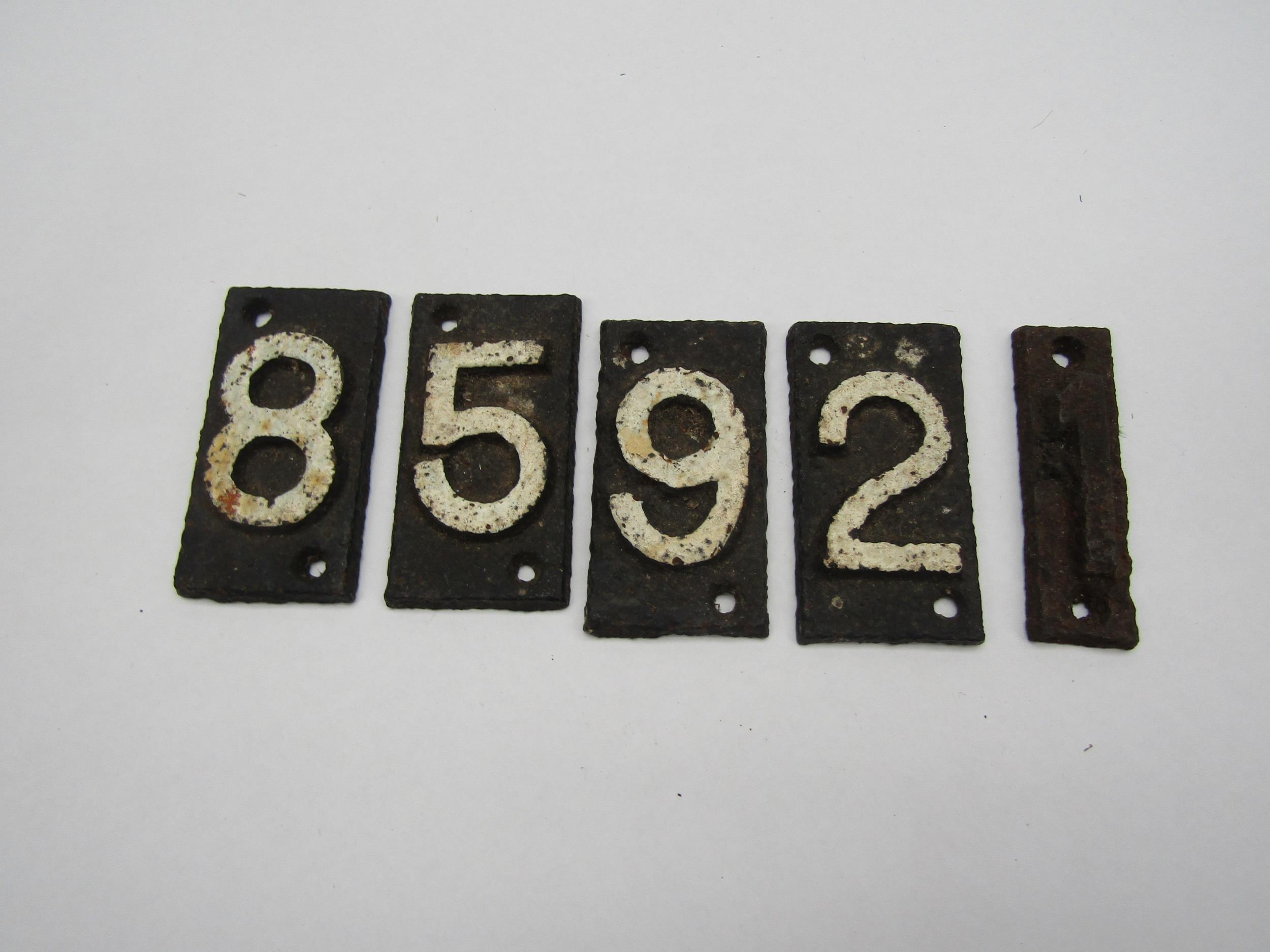 A quantity of cast iron track sleeper numbers