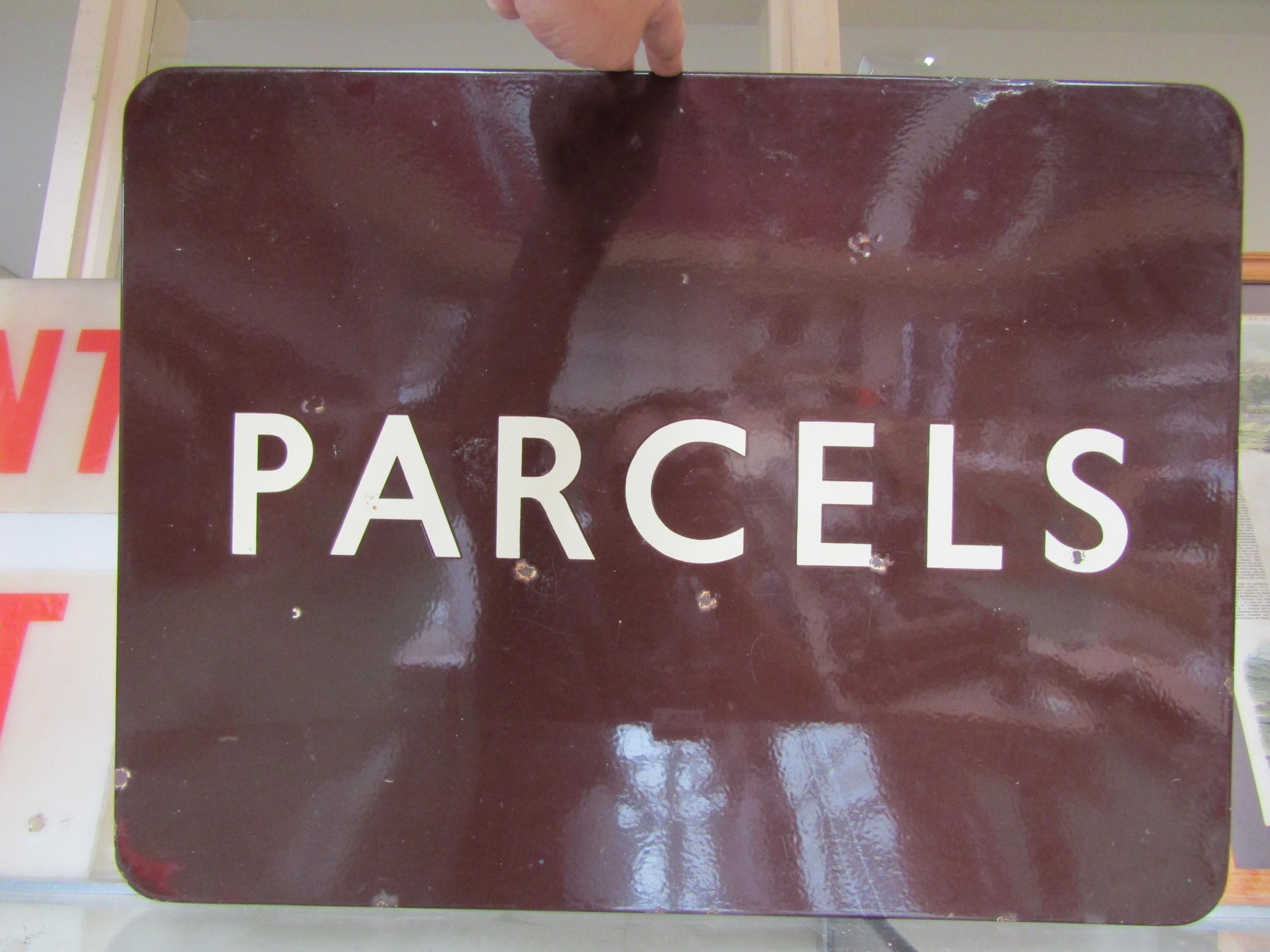 An enamel B.R (W) fully flanged enamel sign - PARCELS, some chips to the front and sides, 61 x 45.