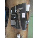 Three cased digital calipers, analog calipers, cased compass set etc